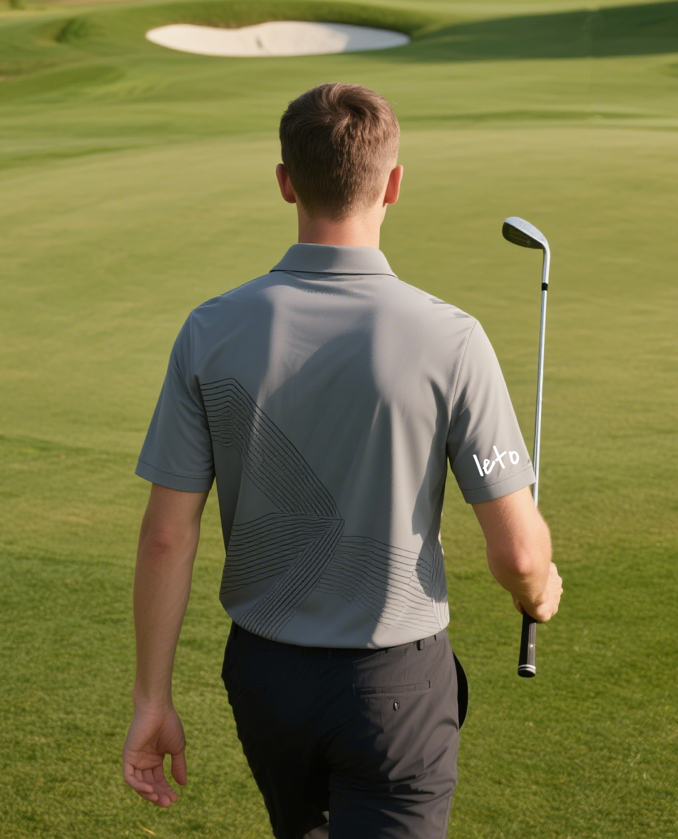 A golfer wearing custom-designed golf apparel with a personalized logo, standing confidently on a vibrant golf course, symbolizing partnership and premium quality